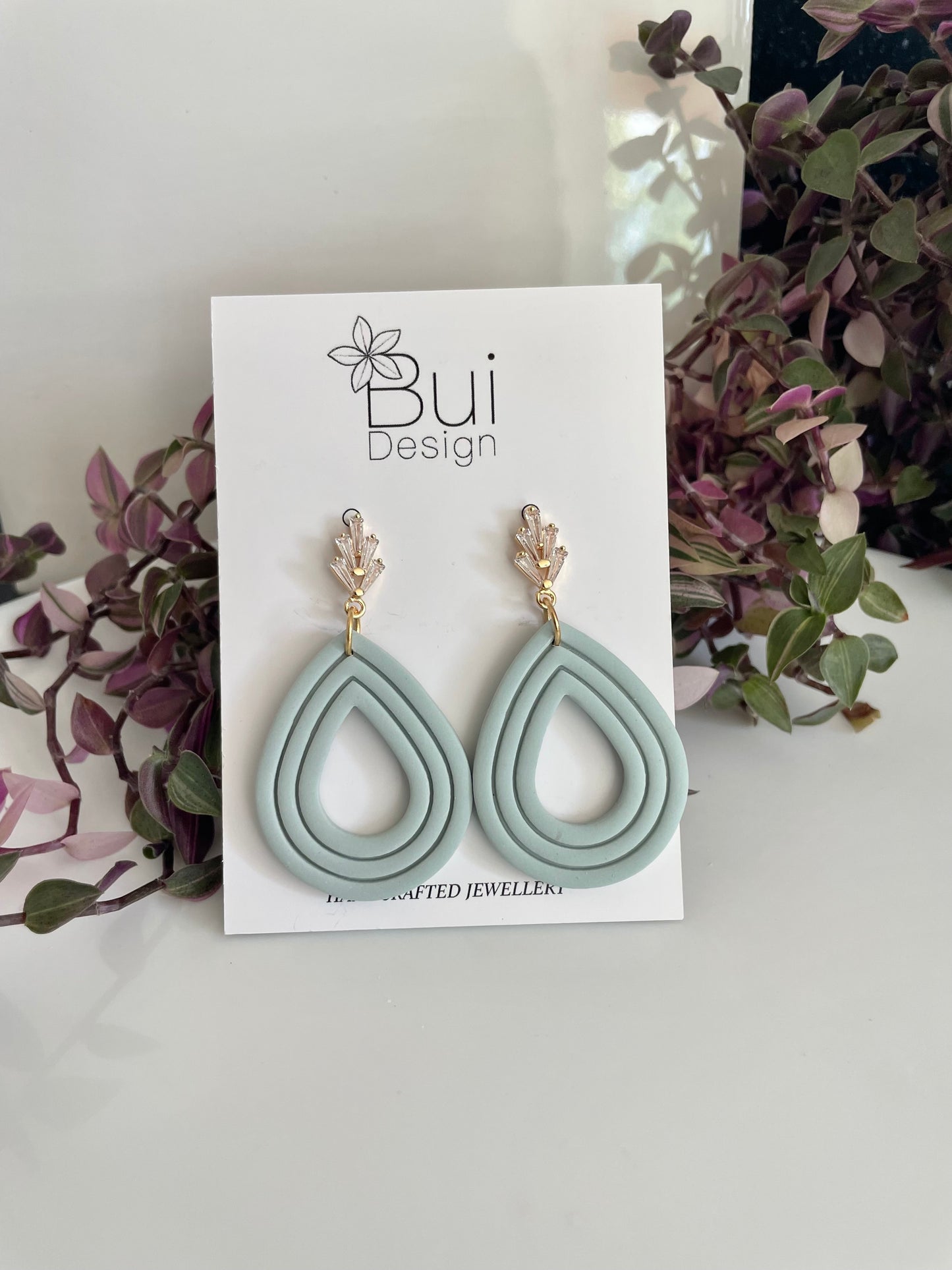 Blue teardrop clay earrings