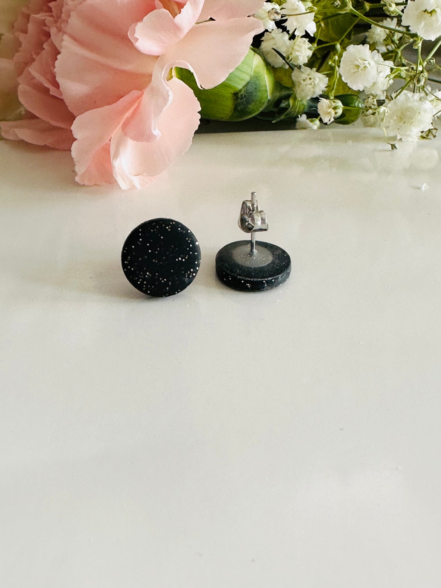 Sparkling black polymer clay stud earrings, 10 mm