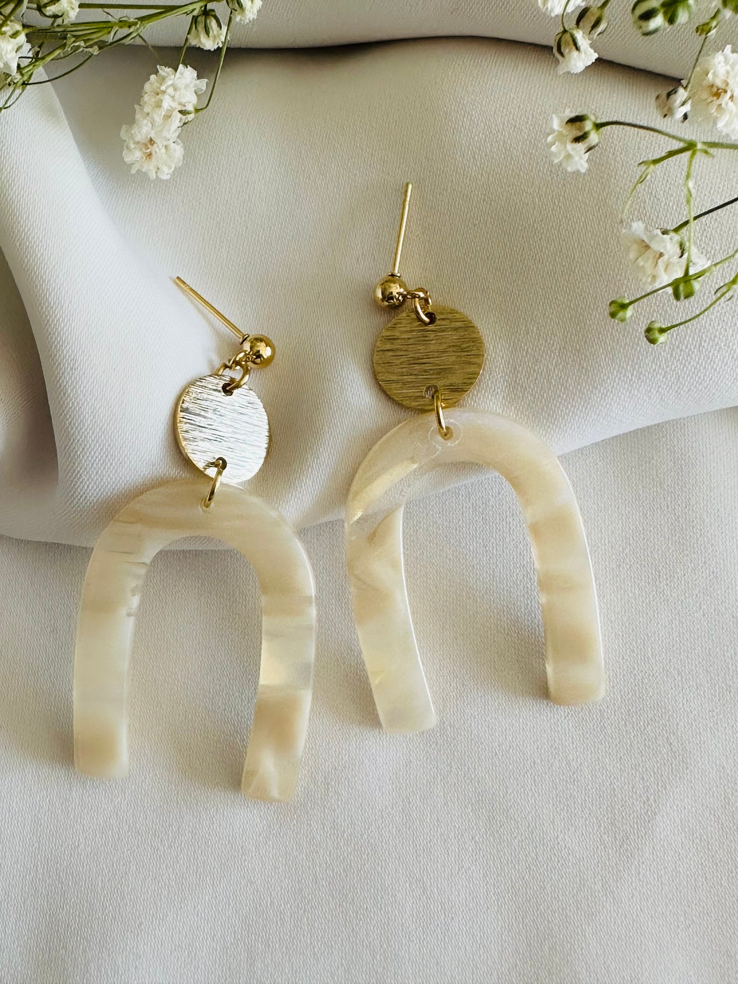 Pearl color acetate resin arch earrings