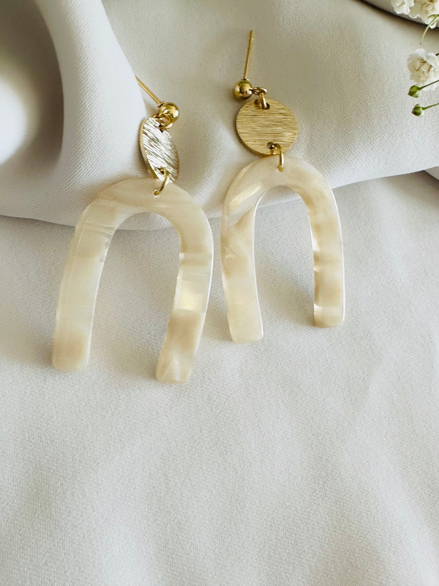 Pearl color acetate resin arch earrings